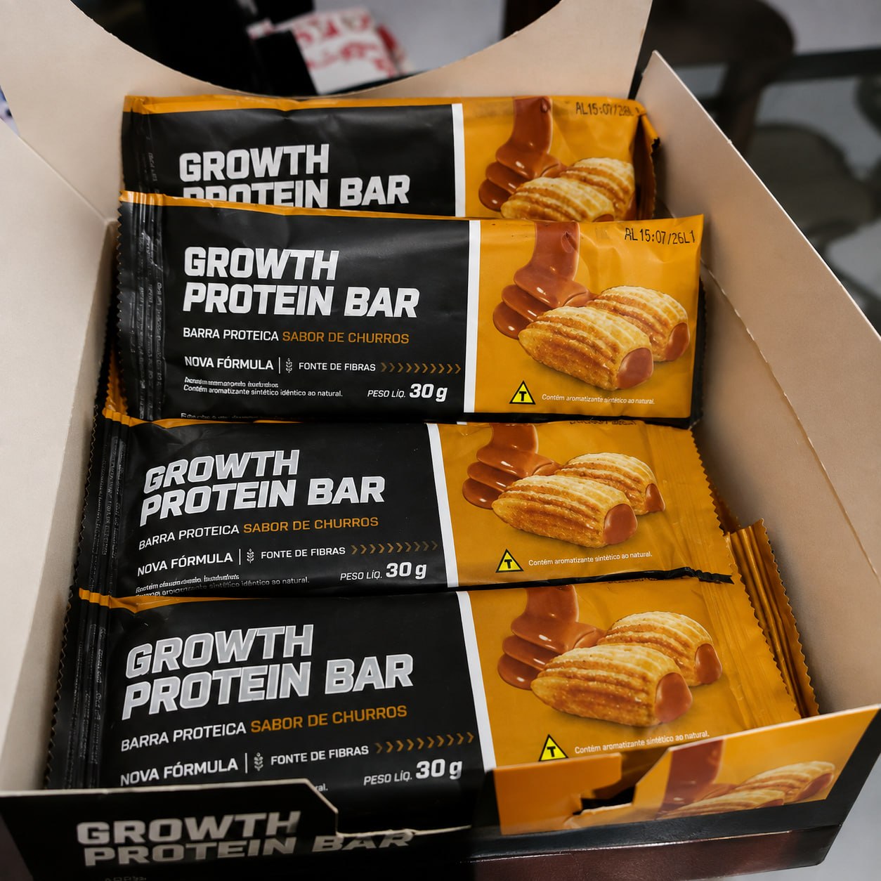 Barra de Proteína Growth Supplements Sabor Churros - Caixa com 12 Un.